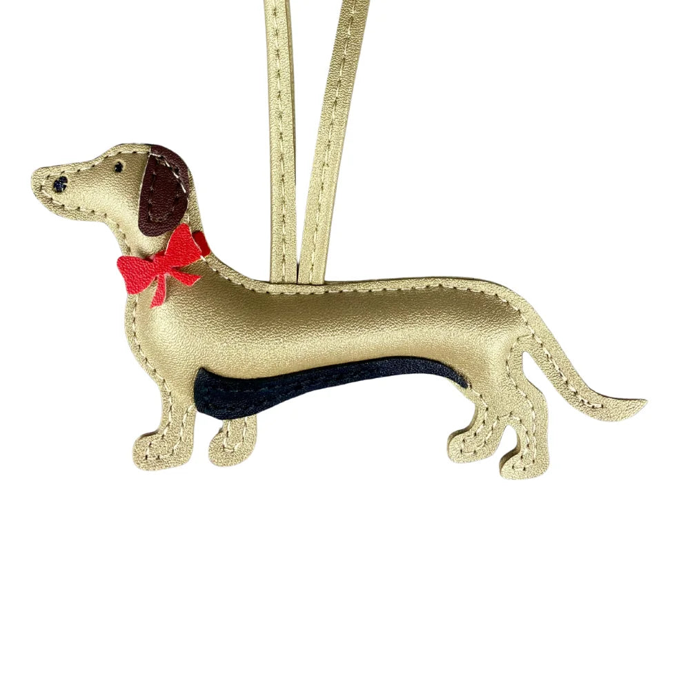Elegant Dachshund Leather Bag Charm with Red Bow – Cute Pet Lover Gift