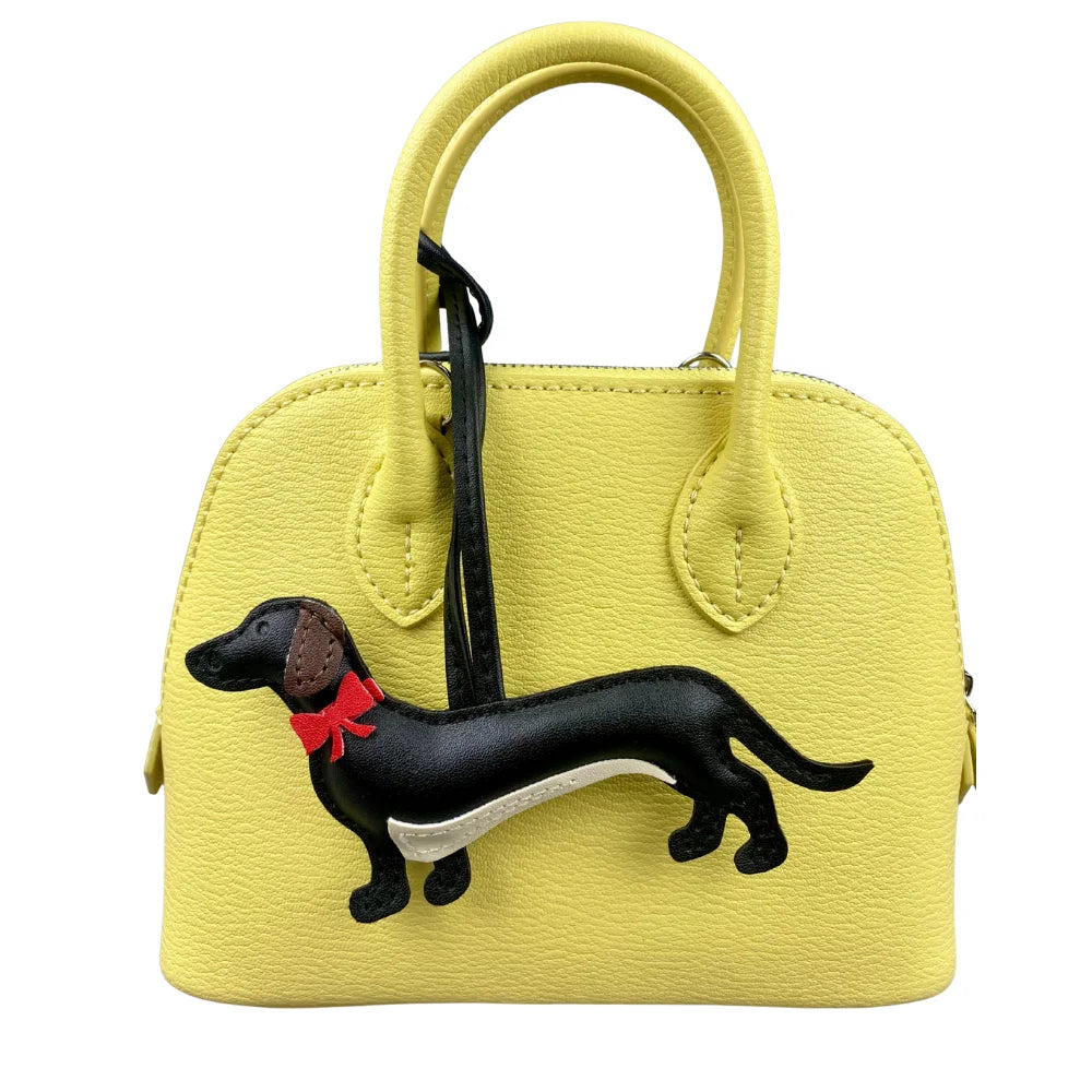 Elegant Dachshund Leather Bag Charm with Red Bow – Cute Pet Lover Gift