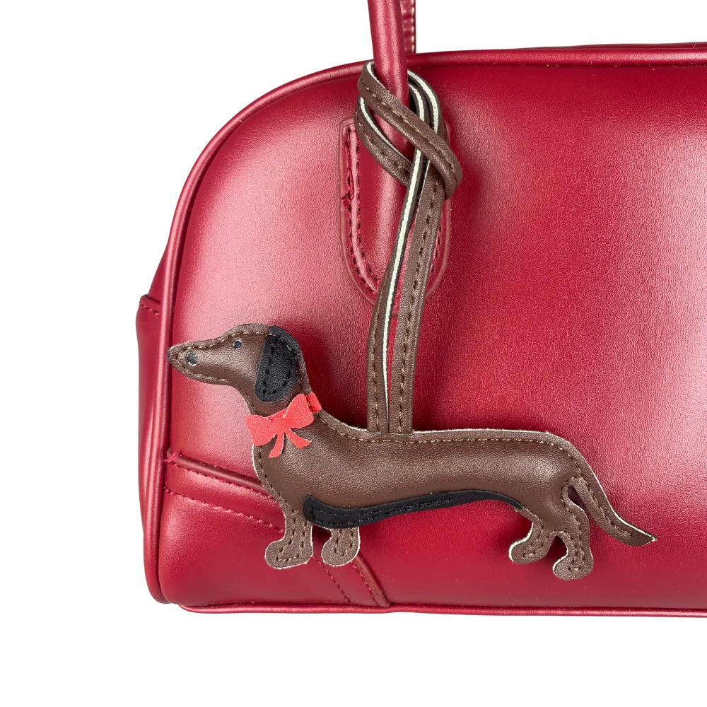 Elegant Dachshund Leather Bag Charm with Red Bow – Cute Pet Lover Gift