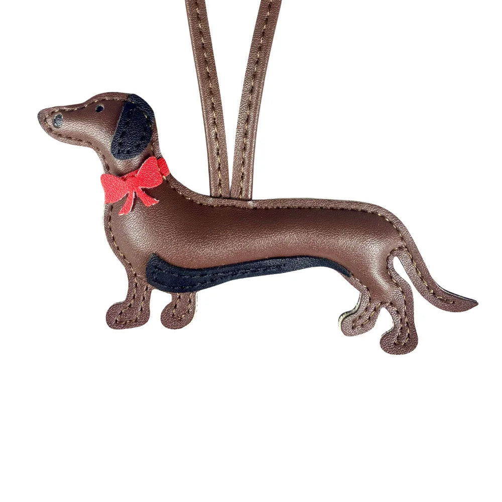 Elegant Dachshund Leather Bag Charm with Red Bow – Cute Pet Lover Gift