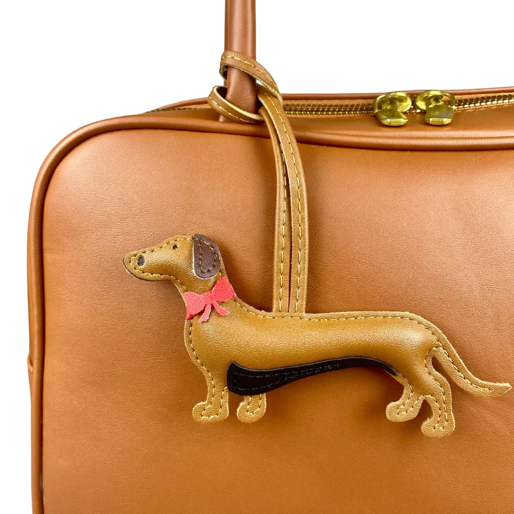Elegant Dachshund Leather Bag Charm with Red Bow – Cute Pet Lover Gift